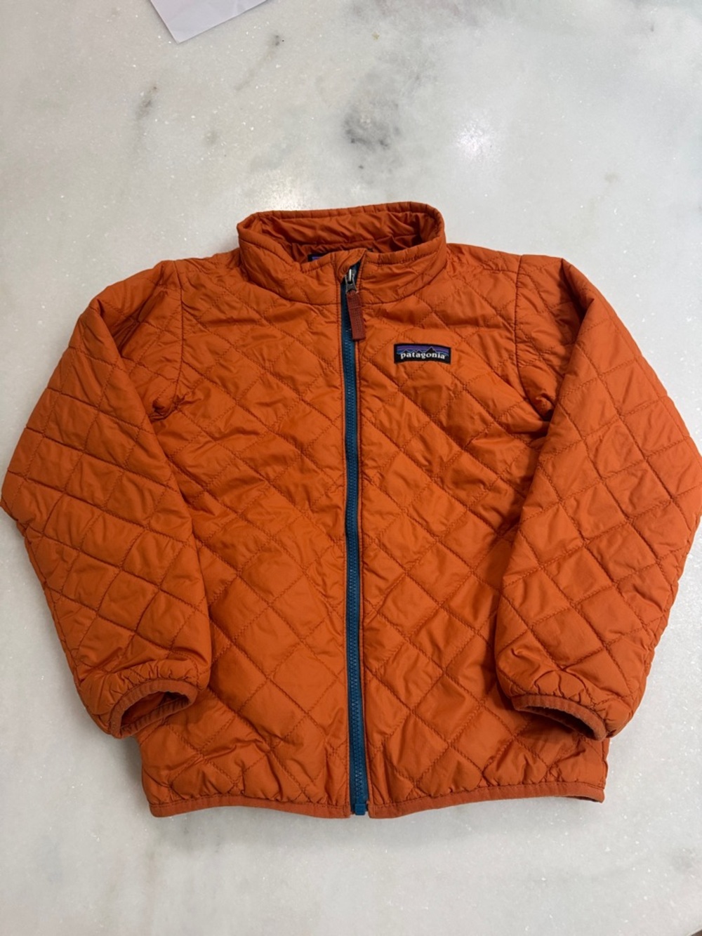 Patagonia Kids Orange Quilted Puffer Jacket with Blue Trim